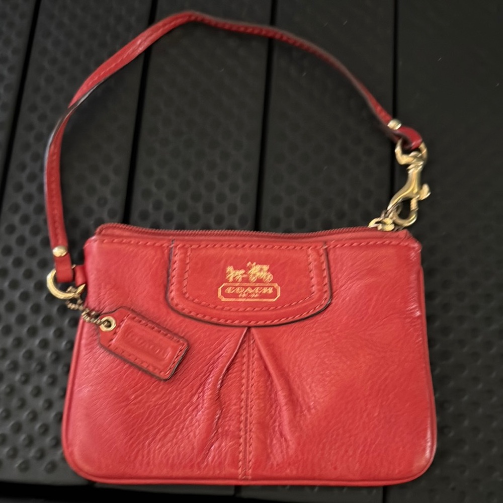 Coach Burnt Orange  Pebbled Leather Wristlet with Gold Hardware